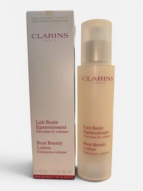 Clarins Bust Beauty Lotion - Cream/Beige Bottle with Pink Text
